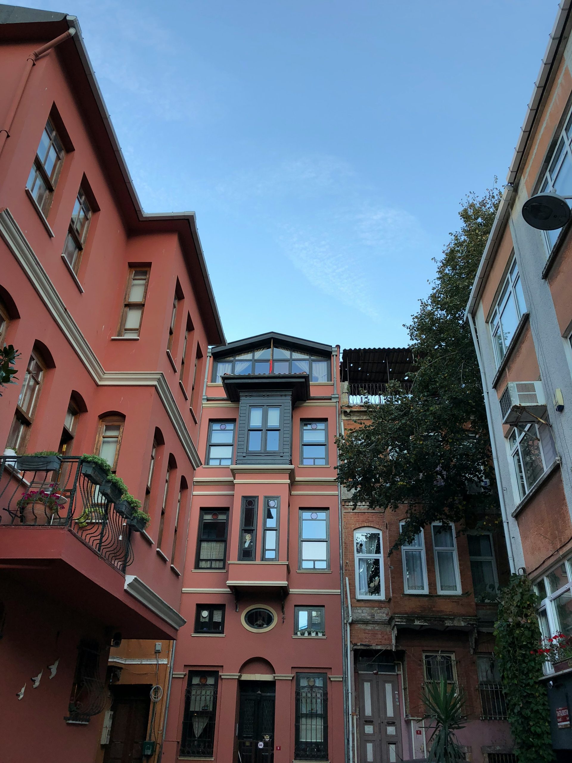 low-angle photography of red buildings