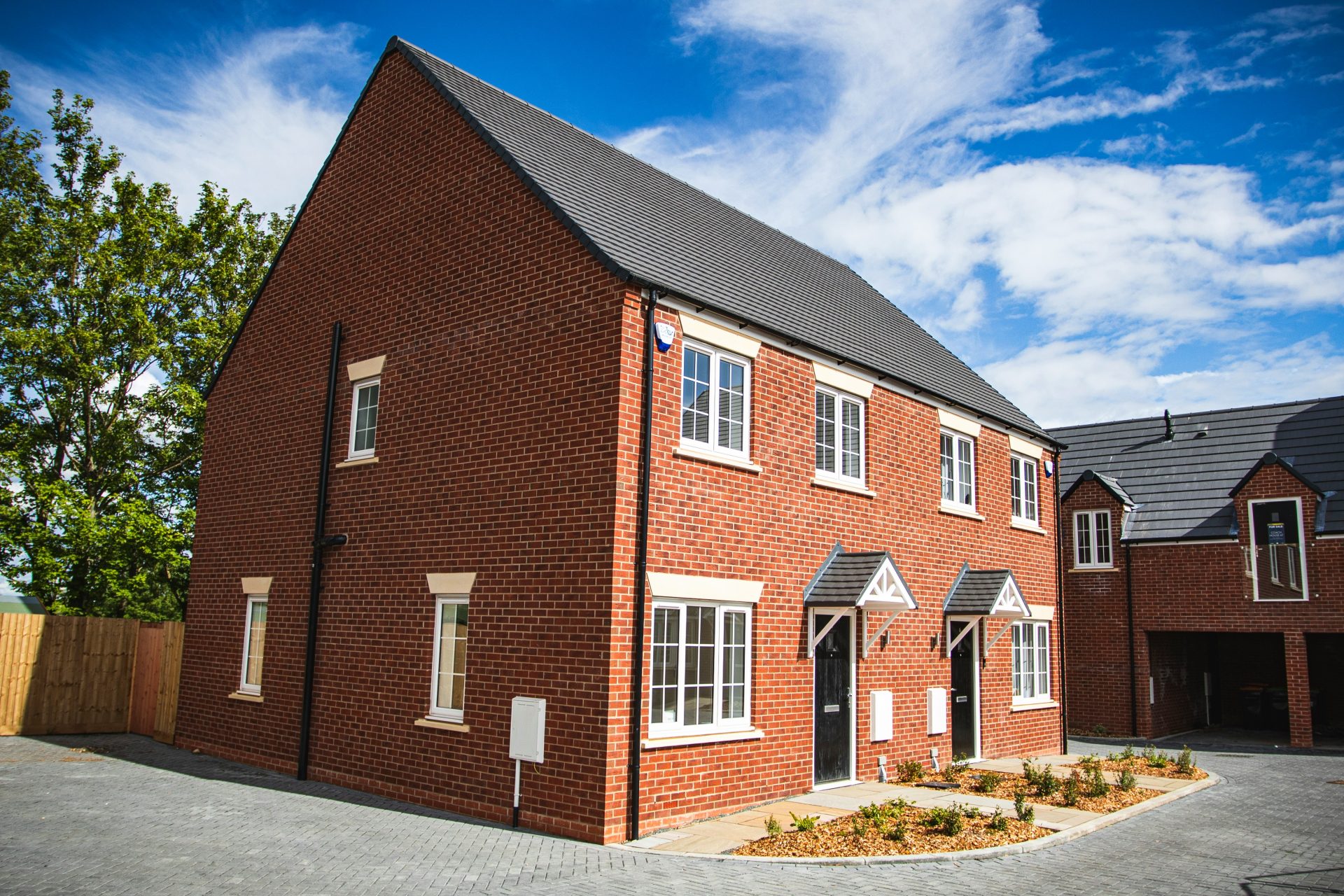 brown brick building under blue sky during daytime